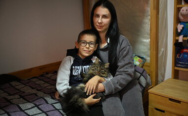 Seven-year-old Timur, his mum Nadiia and their cat Marsyk live in a one-bedroom house in a modular settlement in Mukachevo Seven-year-old Timur, his mum Nadiia and their cat Marsyk live in a one-bedroom house in a modular settlement in Mukachevo